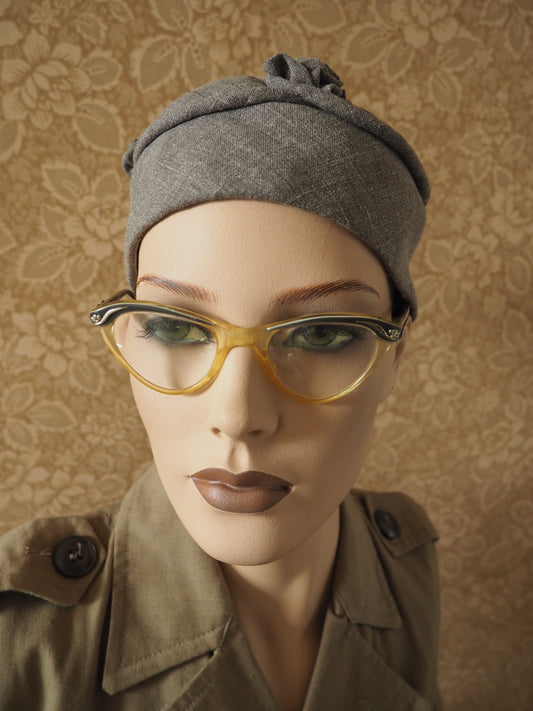 Harmaa koristeltu "pilleri"hattu