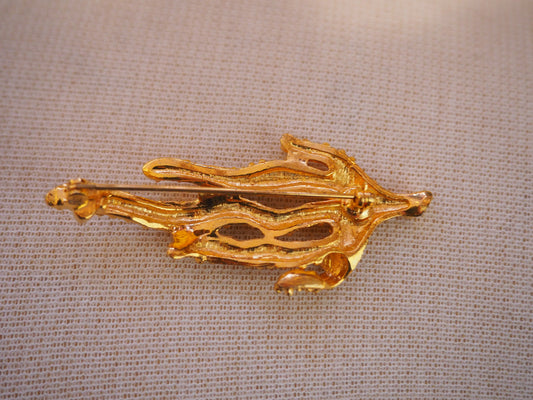 Kullansävyinen koralli rintaneula