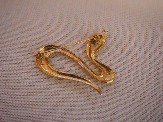 Käärme rintaneula timanttikoristeilla