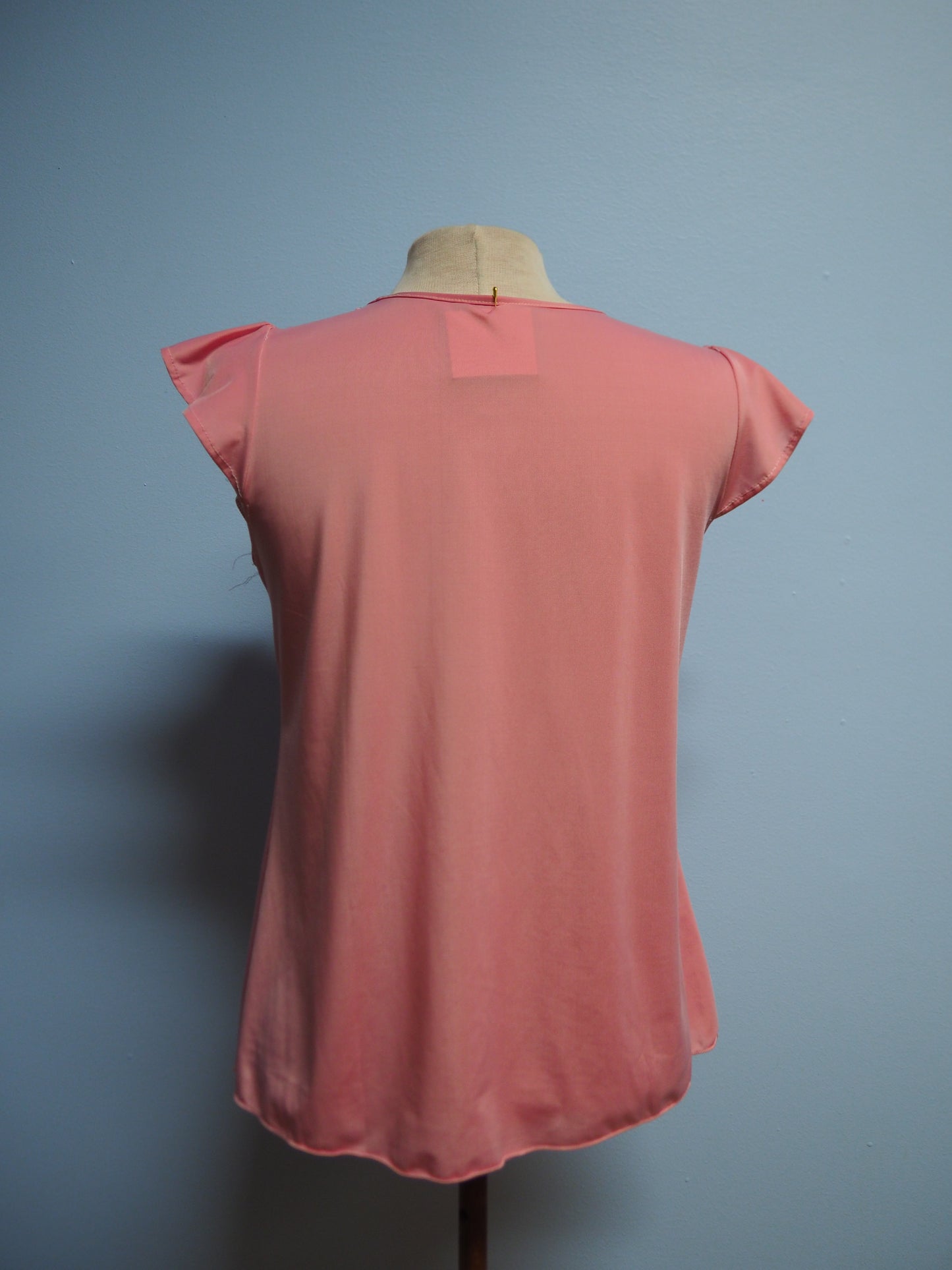 Vaaleanpunainen pitsikuviollinen paita