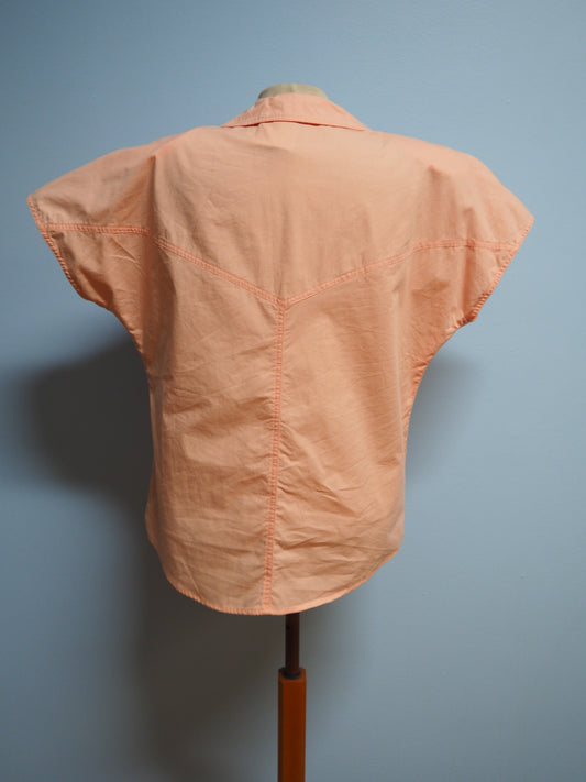 Vaalean oranssi paita