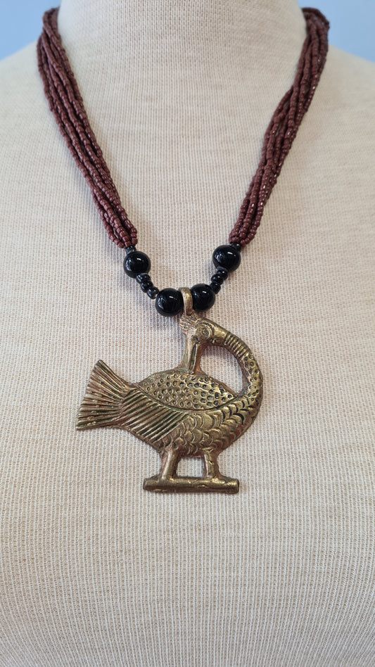 Lintu riipus kaulakoru