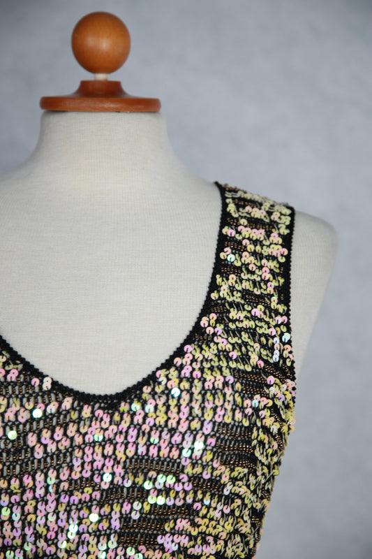 Kimalteleva monivärinen neuletoppi