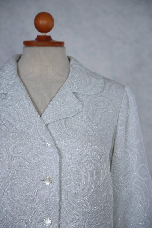 Valkoinen kimalteleva kuviollinen jakku