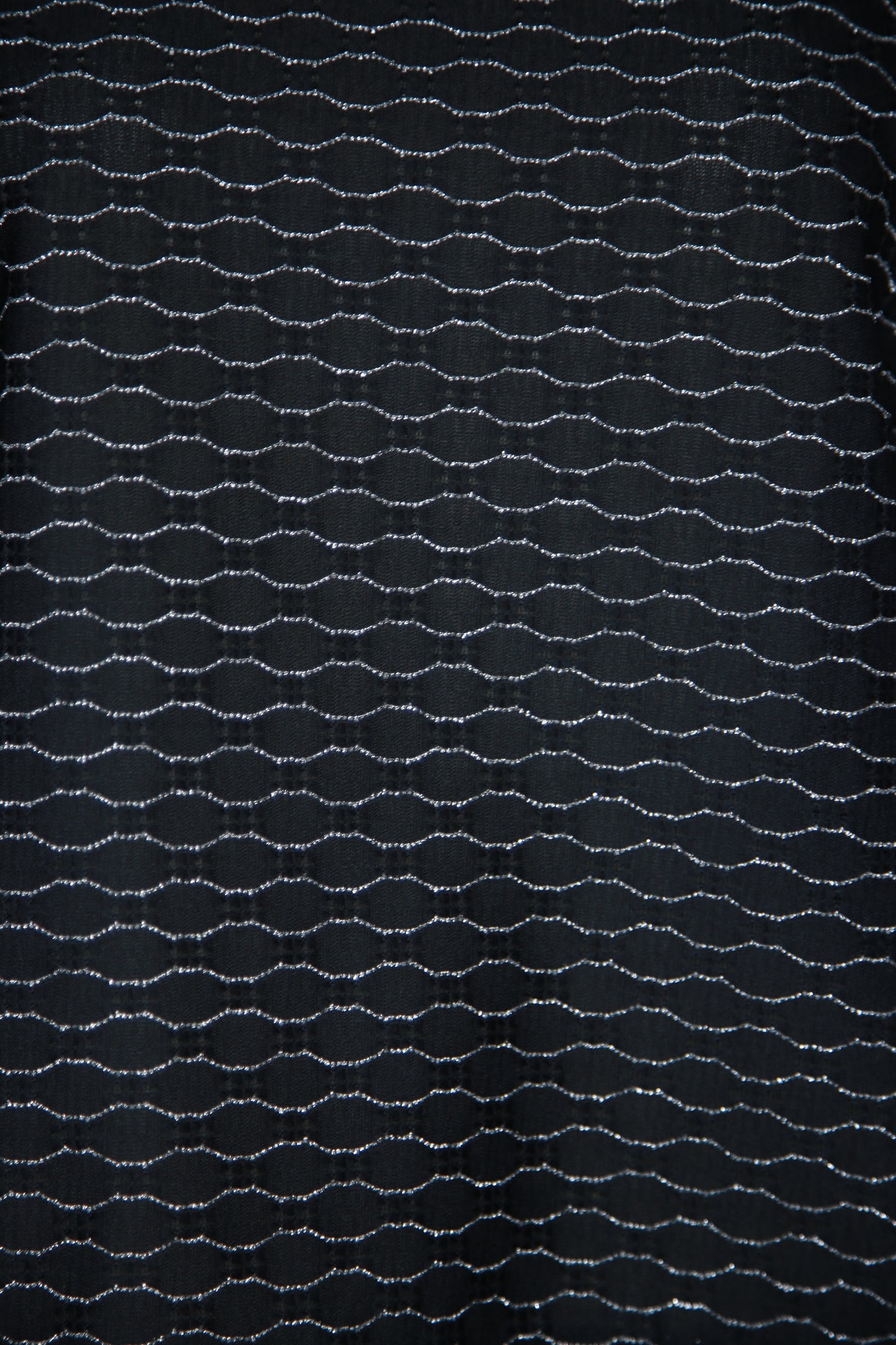 Musta hopeinen kimalteleva läpikuultava pusero