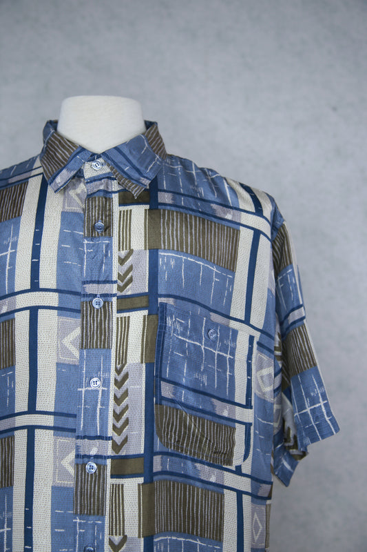 Sinertävä kuviollinen lyhythihainen kauluspaita