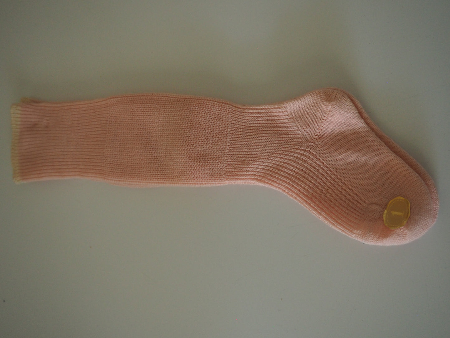 Vaaleanpunaiset Atlaksen vauvan sukat, käyttämätöntä vanhaa varastoa